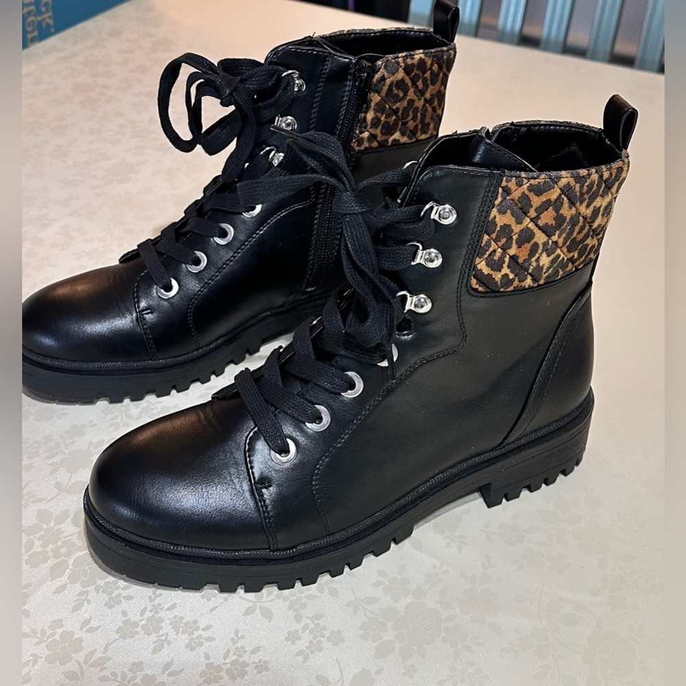 Nine West animal print lug style combat boot.